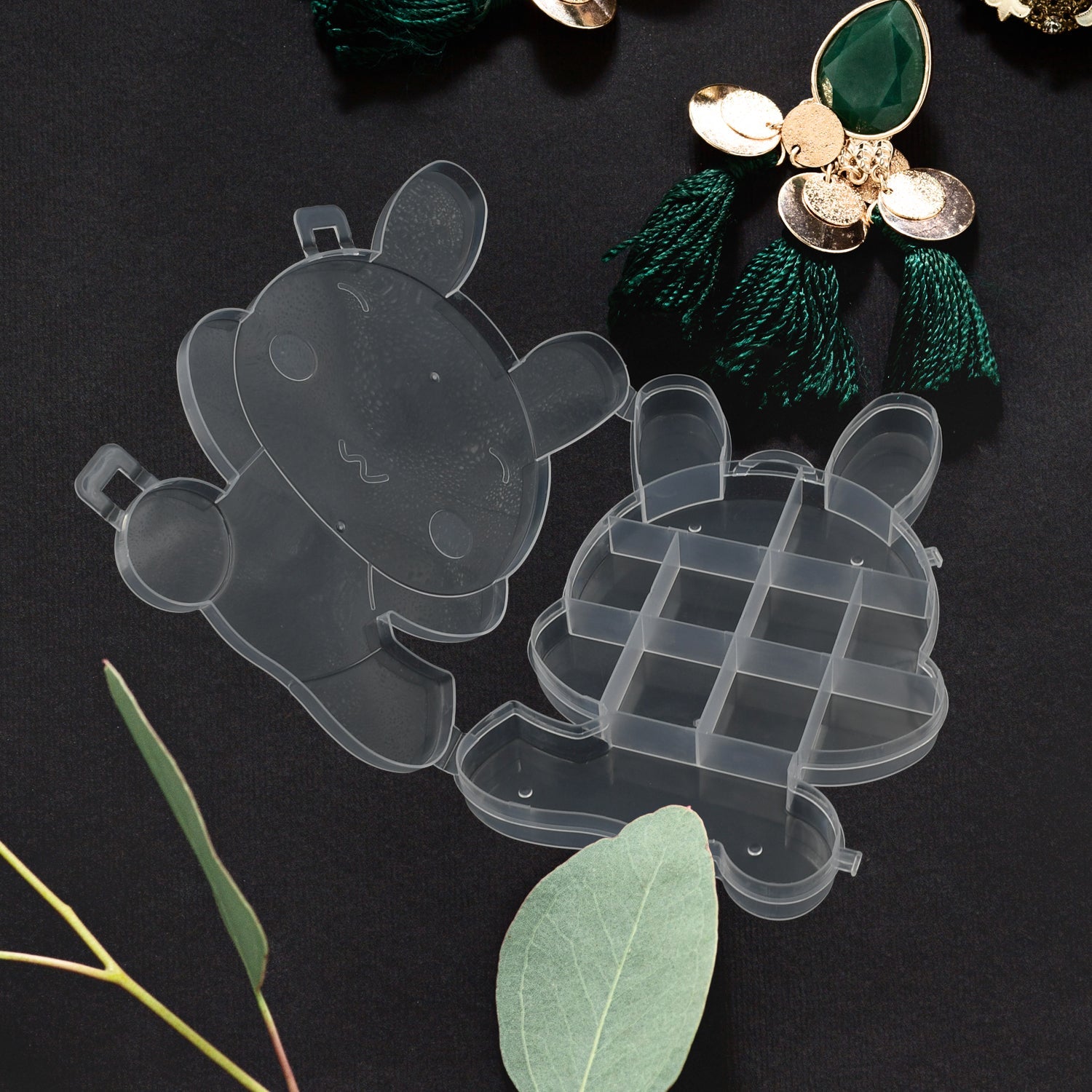 Plastic storage box with bear shape for organizing items.