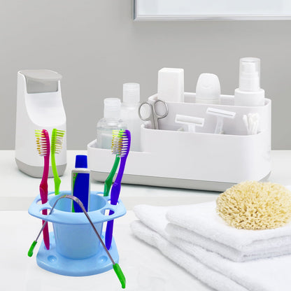 Compact toothbrush holder with multiple slots.