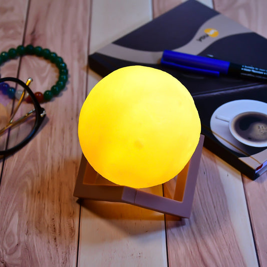 Moon night lamp with wooden stand, perfect for cozy bedroom lighting.