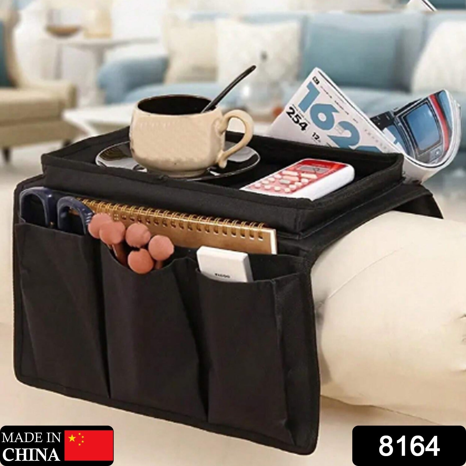 Black sofa armrest organizer for magazines