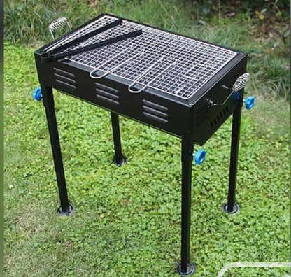 Barbecue grill with skewers and wooden handle